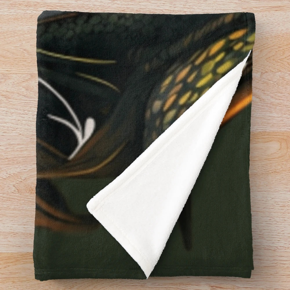 Plush blanket featuring a variety of mythical creatures and magical beings