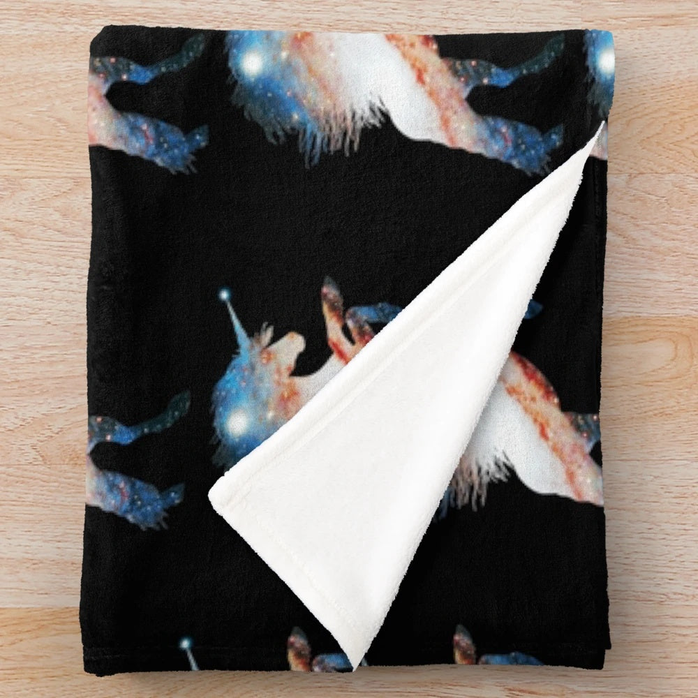 Plush blanket with a silhouette of a rearing unicorn against a galaxy background