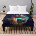 Plush blanket featuring a design of various mythical creatures and fantasy beings