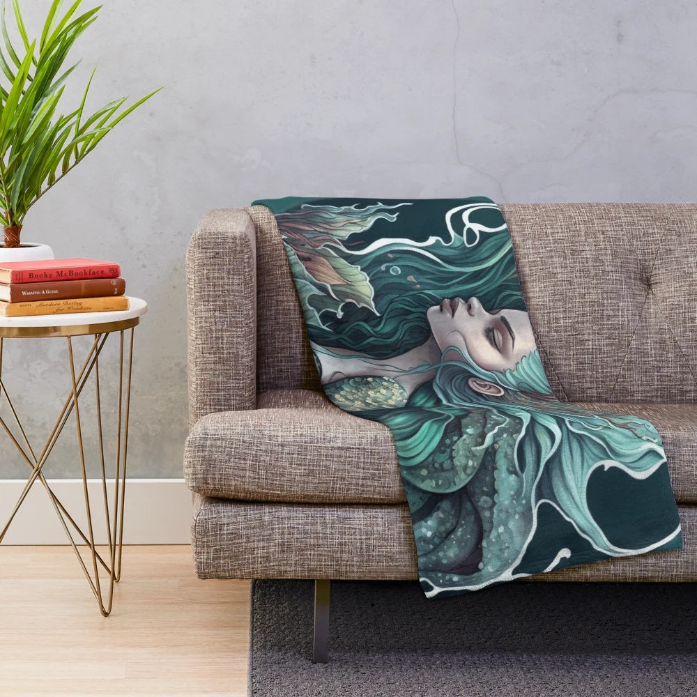 Plush blanket featuring mythical sea creatures