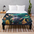 Plush blanket featuring a design of enchanting mythical sea creatures