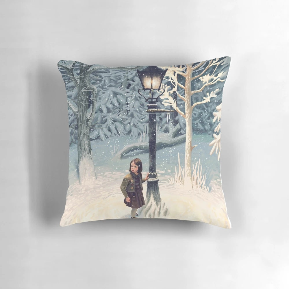 Decorative fantasy pillow featuring the iconic lamppost from the Chronicles of Narnia, with Lucy Pevensie