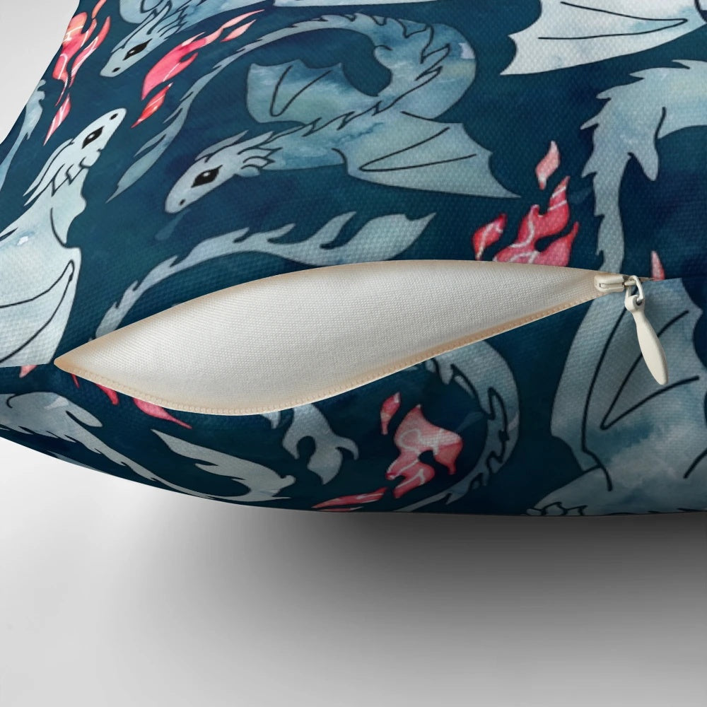 Navy blue pillow with a seamless watercolor design of a cute fire-breathing dragon