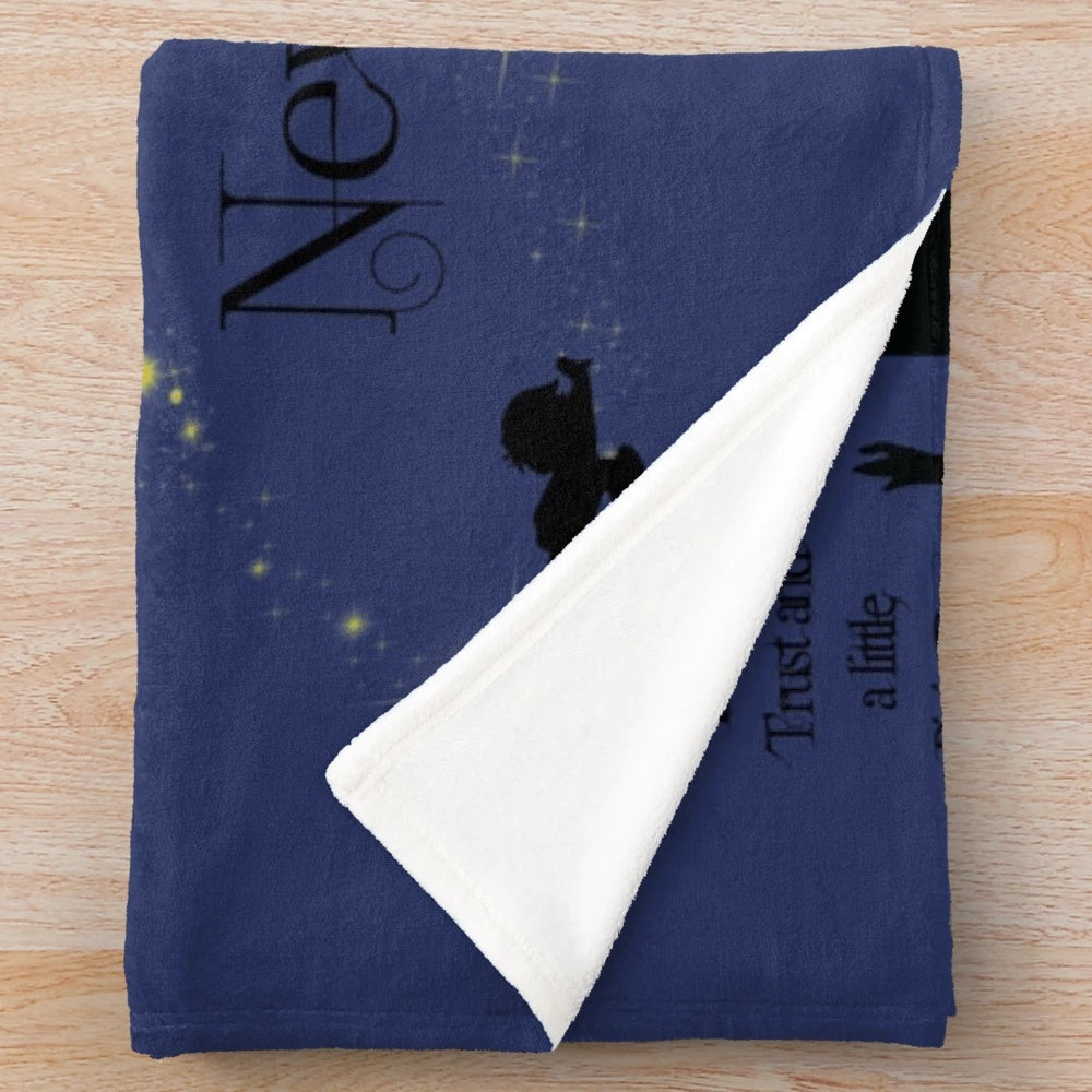 Neverland-inspired plush blanket with silhouettes and midnight blue hues