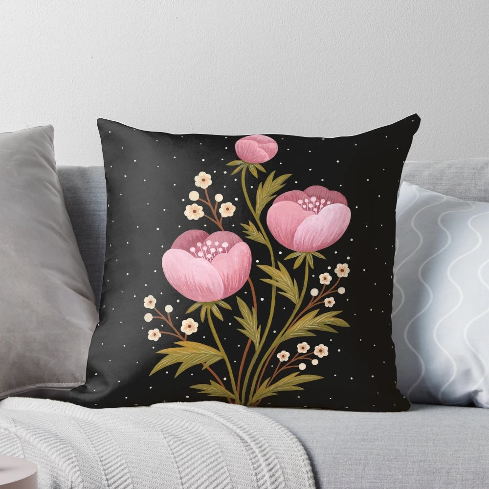 A dark, moody pillow featuring a gouache painting of night blooming flowers and botanicals.