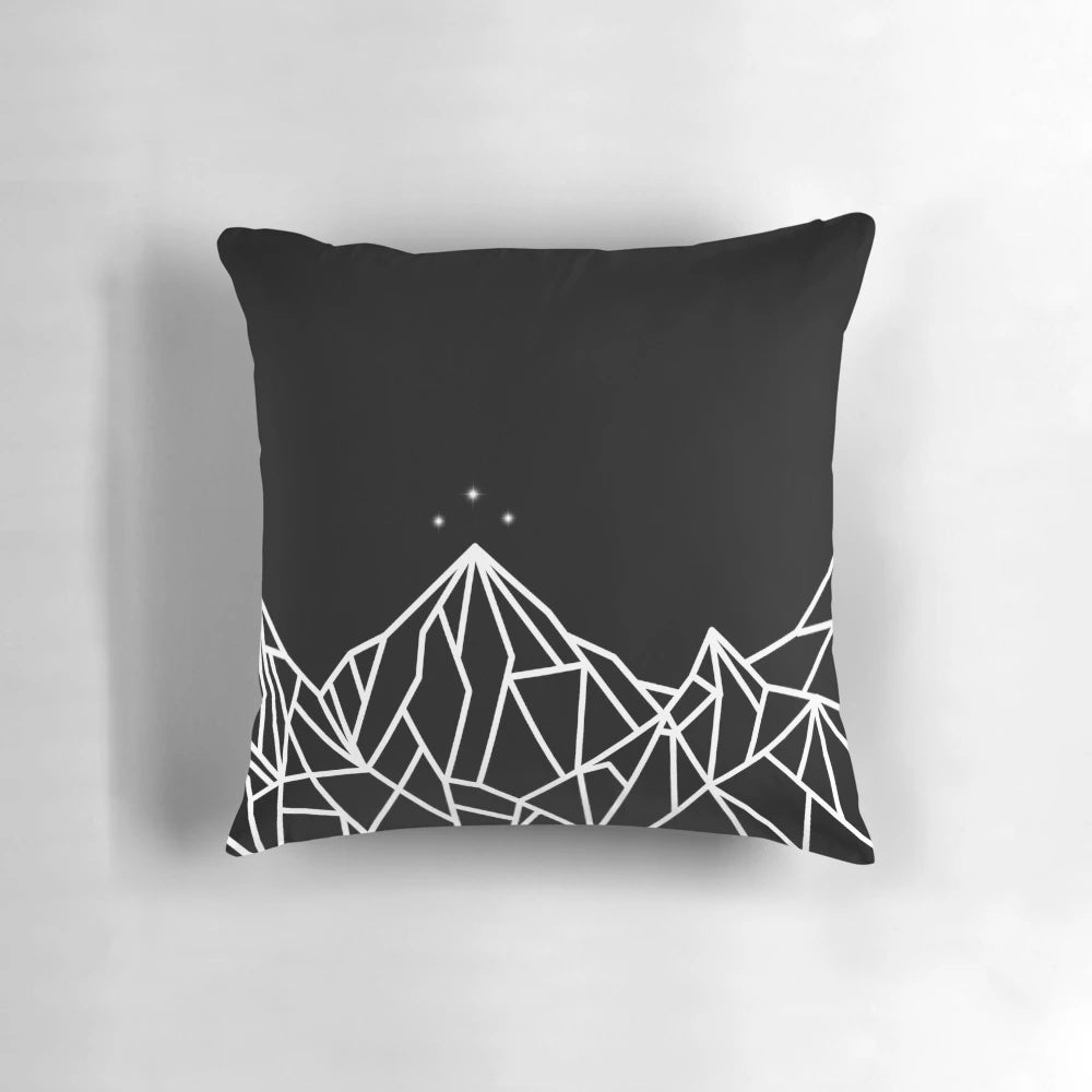 Decorative pillow featuring a geometric mountain design inspired by the Night Court from the A Court of Thorns and Roses series by Sarah J. Maas.