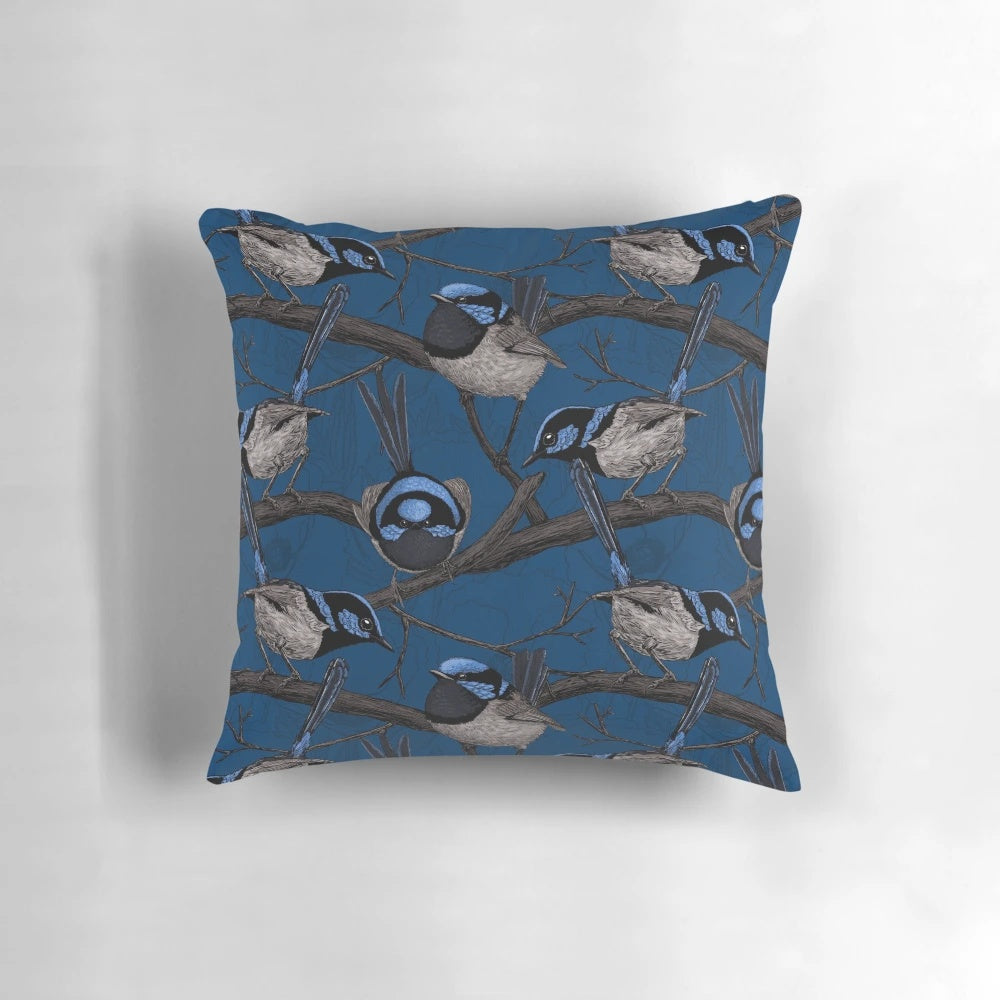 Vibrant blue and white pattern of a night fairy wren bird on a decorative throw pillow.