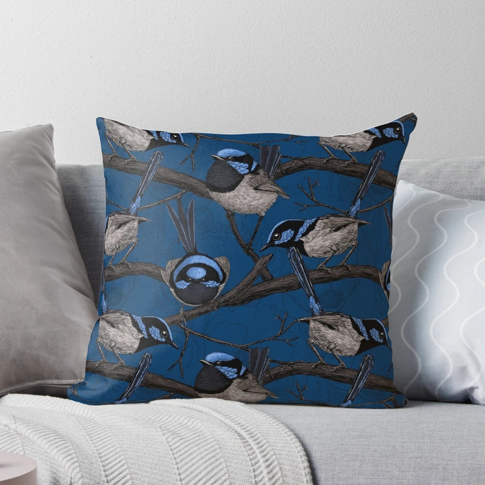 Vibrant blue and white pattern of a night fairy wren bird on a decorative throw pillow.
