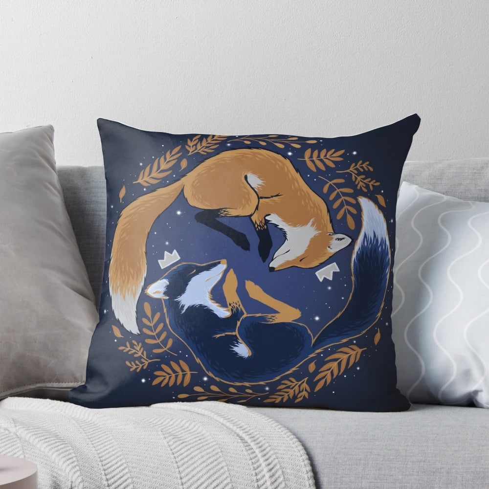 A decorative pillow featuring a captivating night foxes design with golden leaves and a starry sky backdrop.