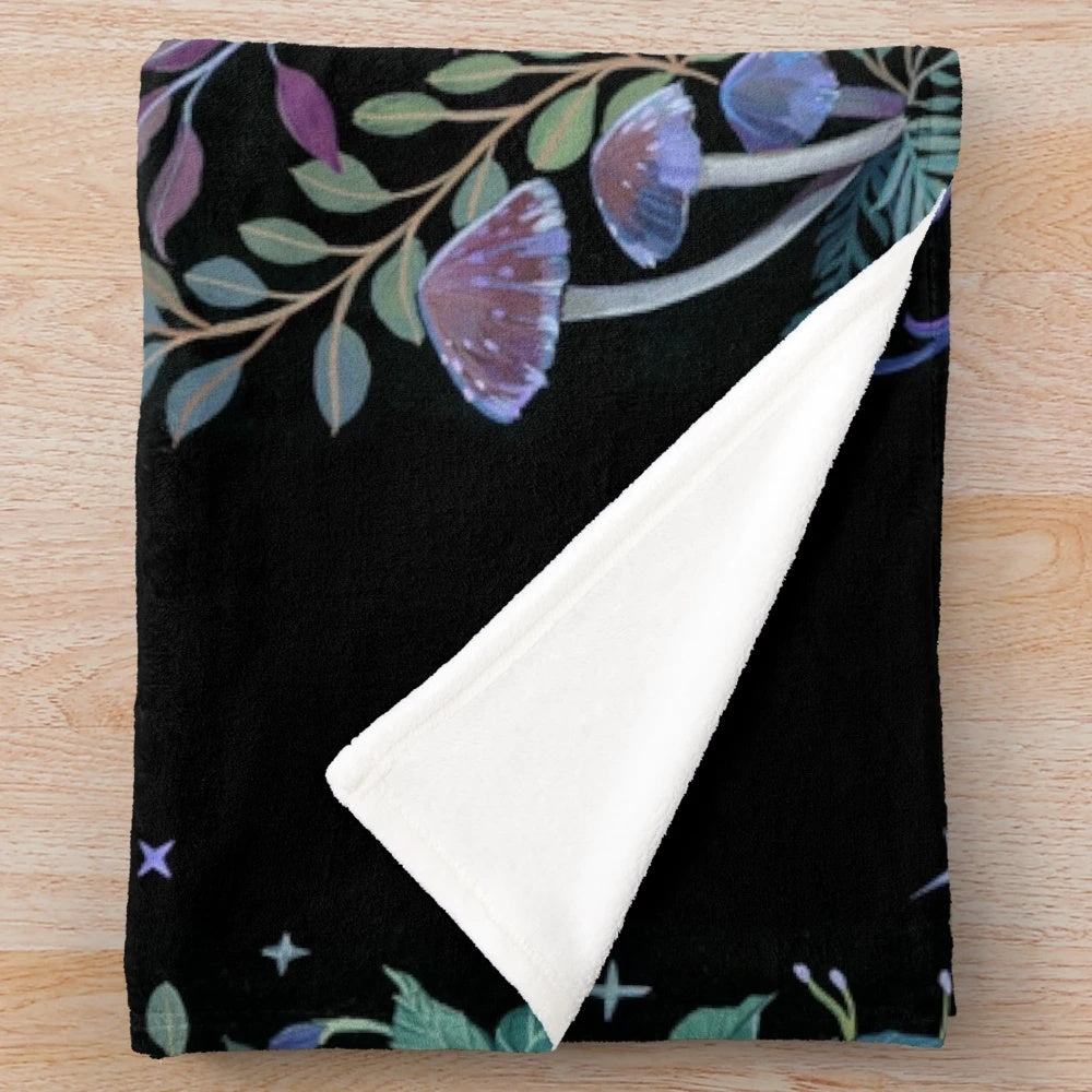 Soft and cozy plush blanket featuring a whimsical moth design against a starry night sky