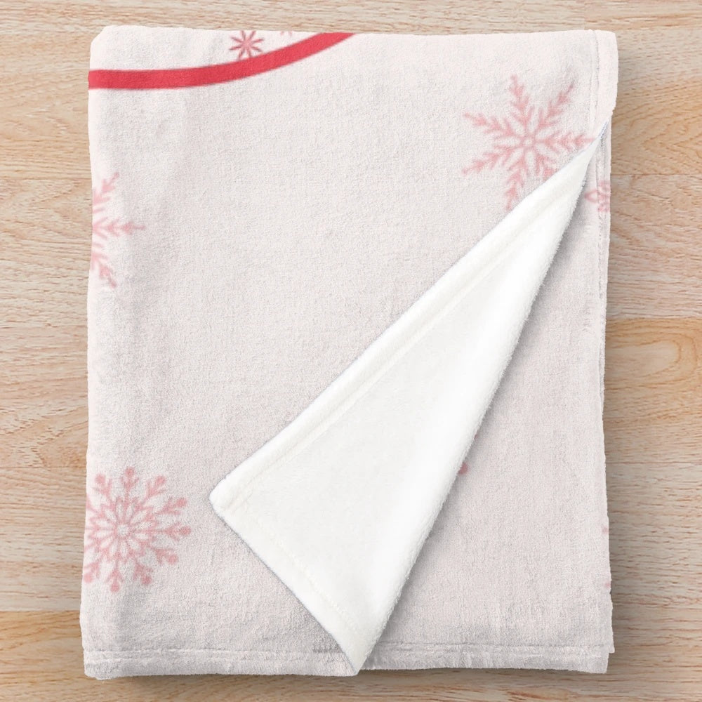 Nutcracker-inspired holiday plush blanket with ballet dancer and snowflake design