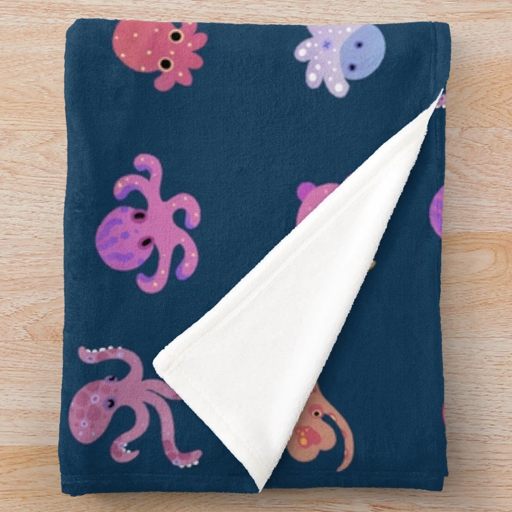 Dark octopus plush blanket with marine life pattern