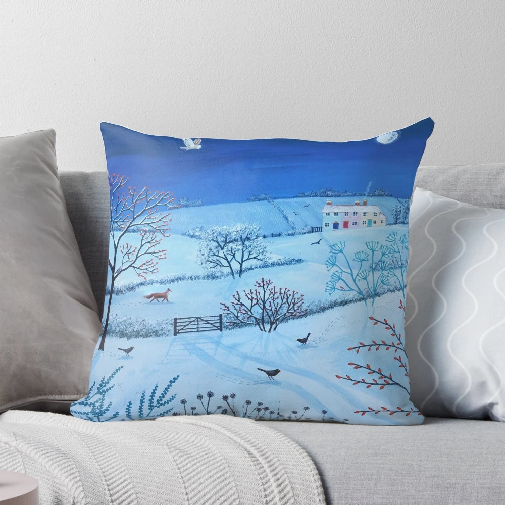 Serene snow-covered landscape at night with a full moon and wandering fox, featured on a decorative pillow