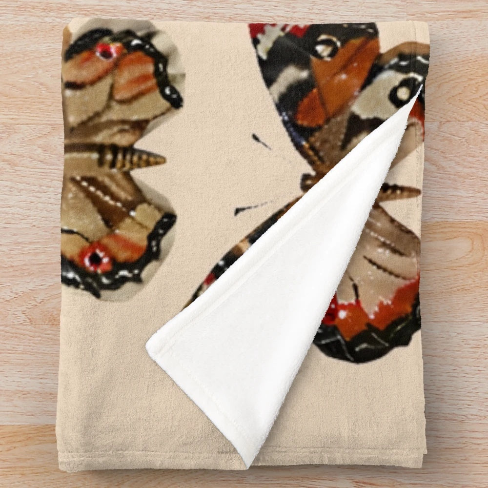 Soft and plush butterfly blanket in a colorful, spring-inspired design
