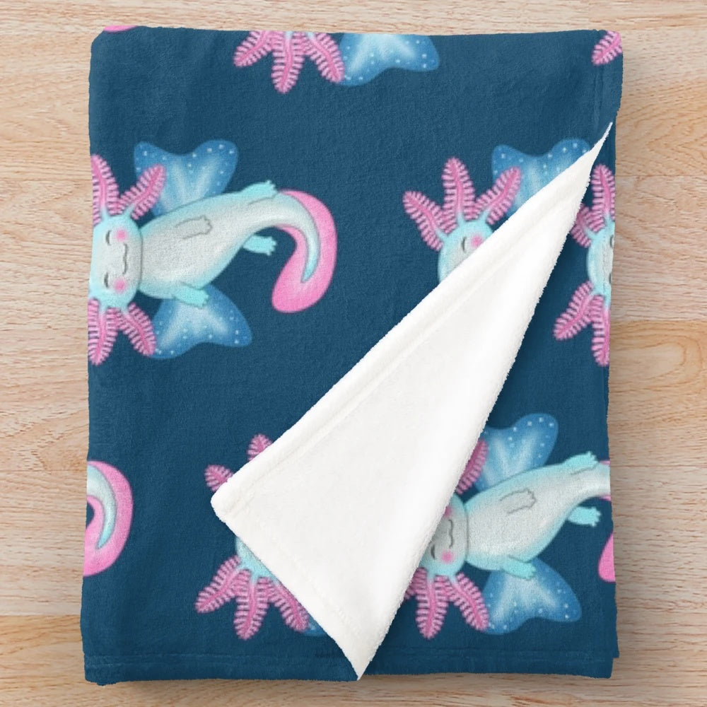 Pastel-colored plush blanket featuring a cute, fairy-like axolotl flying with butterflies