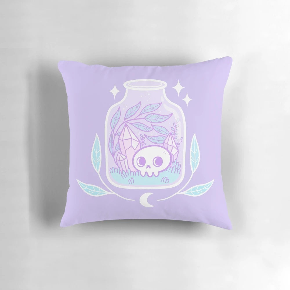Pastel terrarium pillow with crystals, skull, and moon - Nikury witchy home decor
