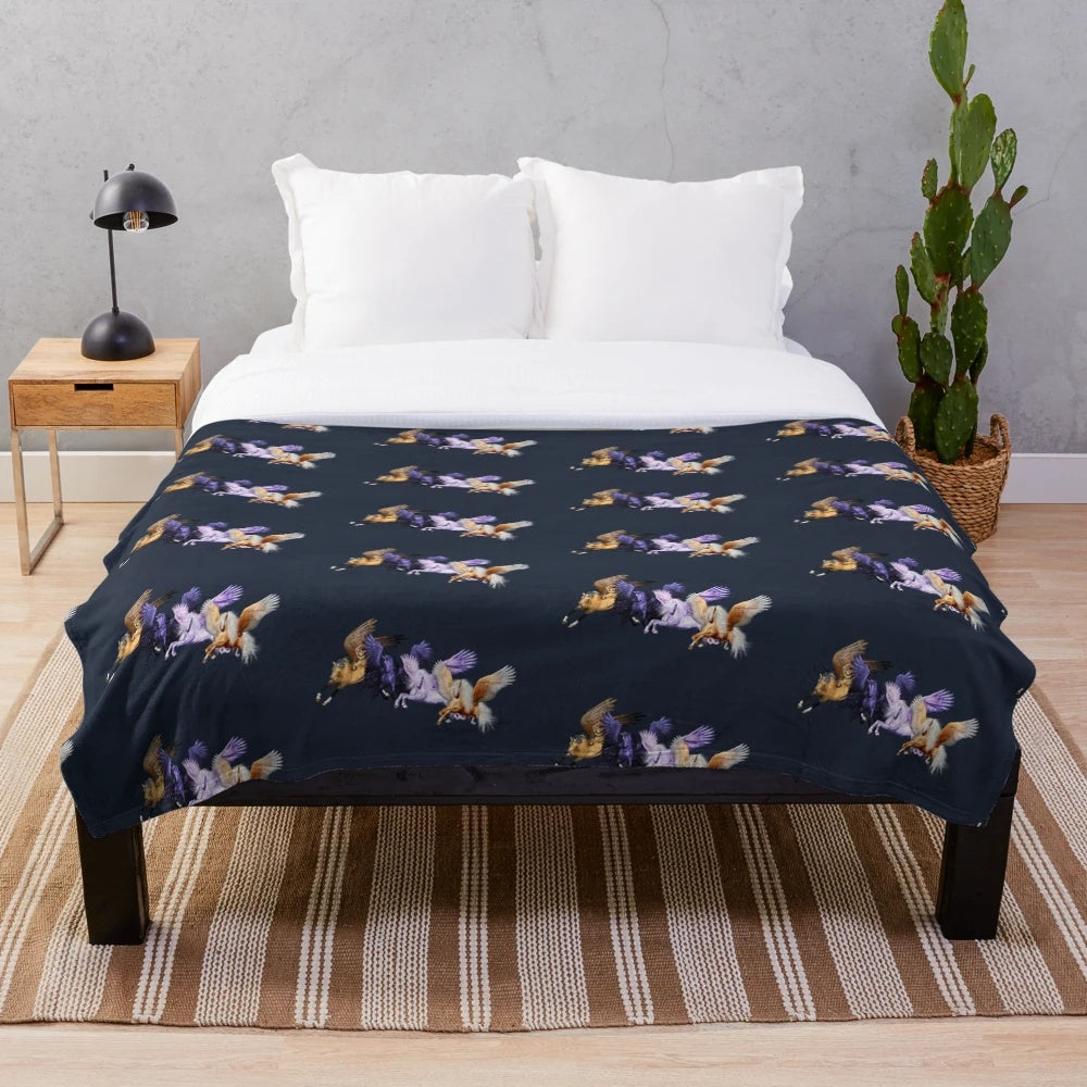 Soft plush blanket featuring a design of magical flying pegasus horses