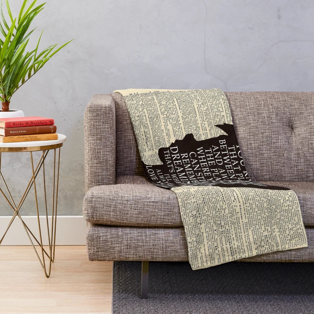Peter Pan-inspired plush blanket featuring a vintage dictionary page design