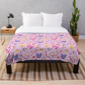 Soft and cozy pink plush blanket featuring a magical girl anime-inspired design