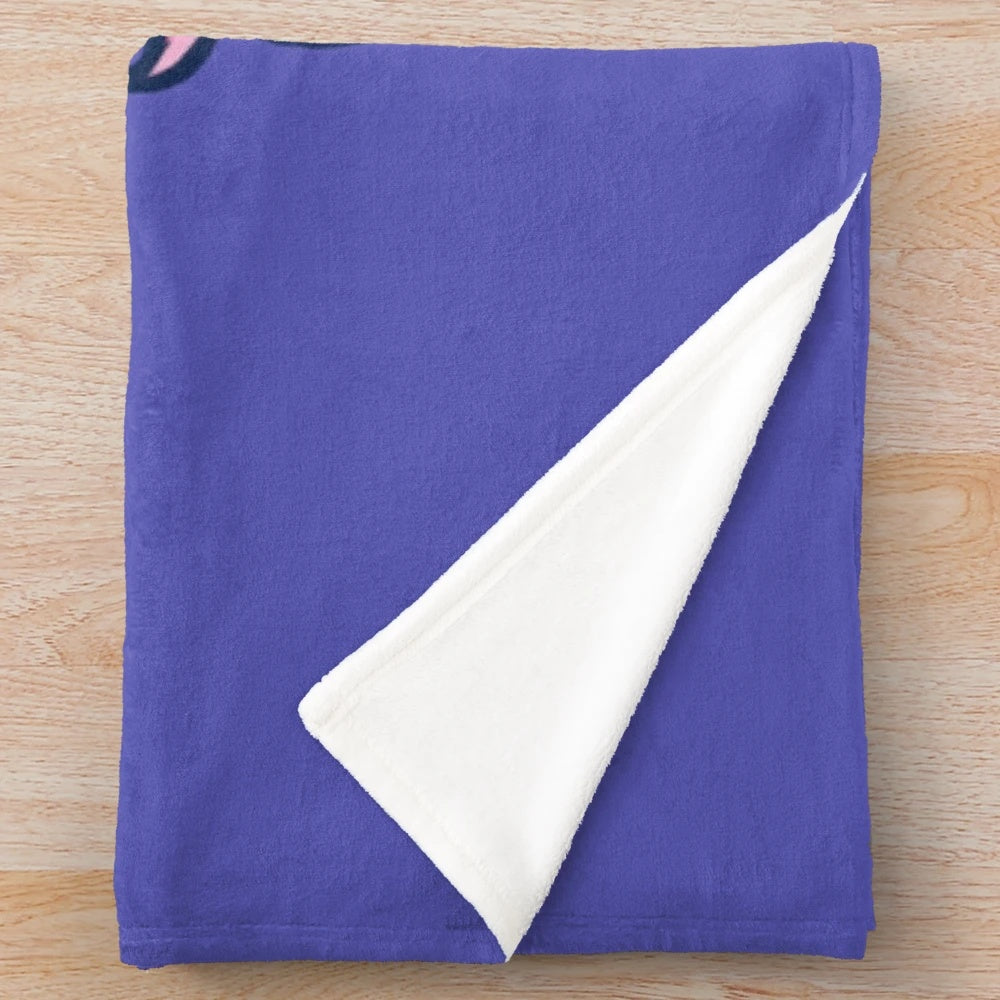 Pink unicorn plush blanket with a magical design