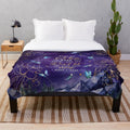 Plush blanket with a fantasy-inspired night sky and stars design