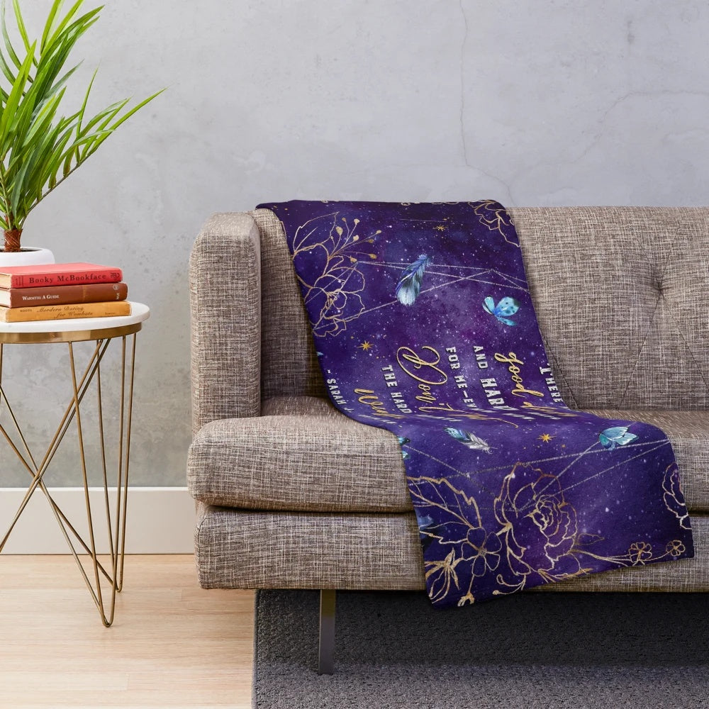 Plush blanket with a fantasy-inspired night sky and stars design