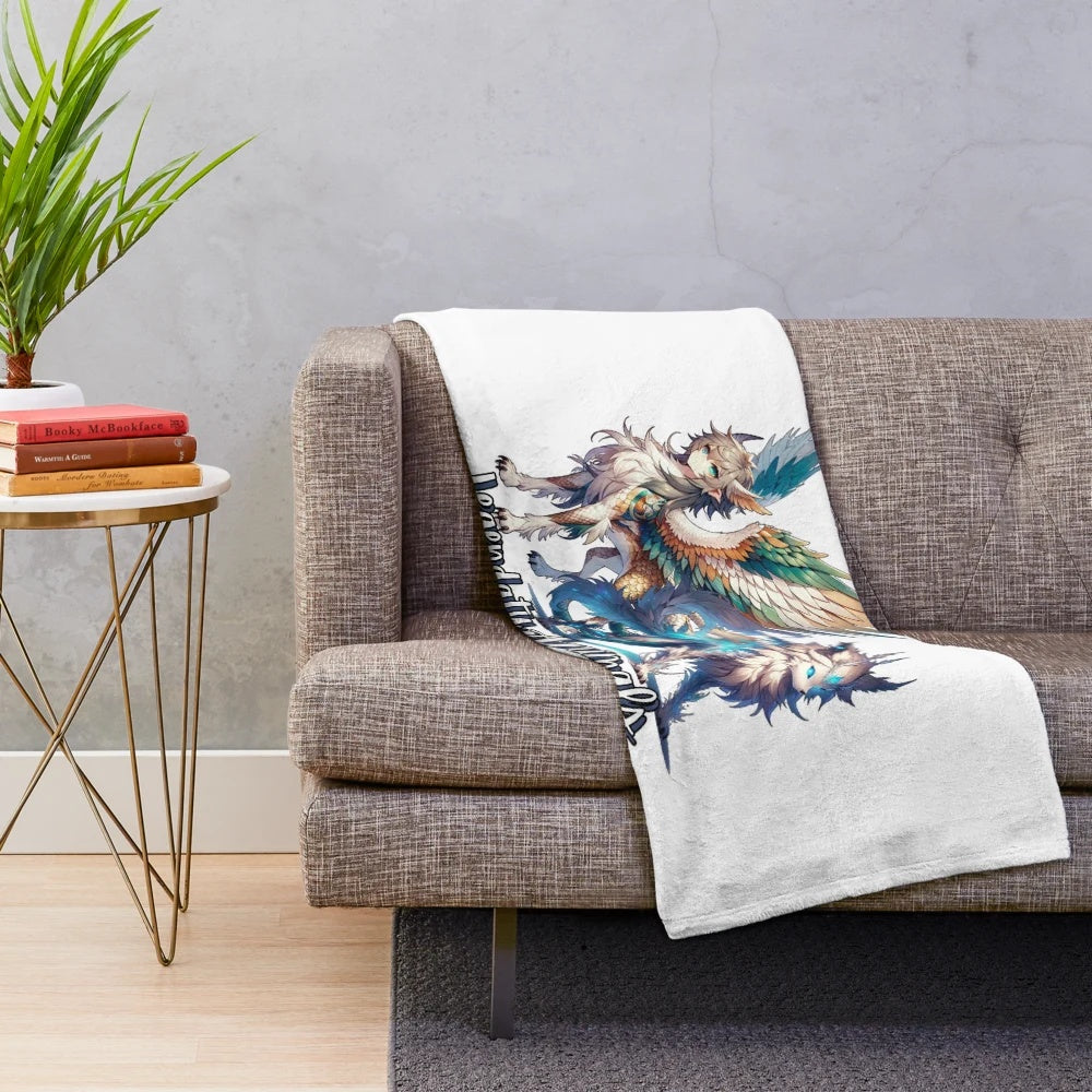 Plush blanket with illustrations of fantastical creatures like unicorns, dragons, and griffins