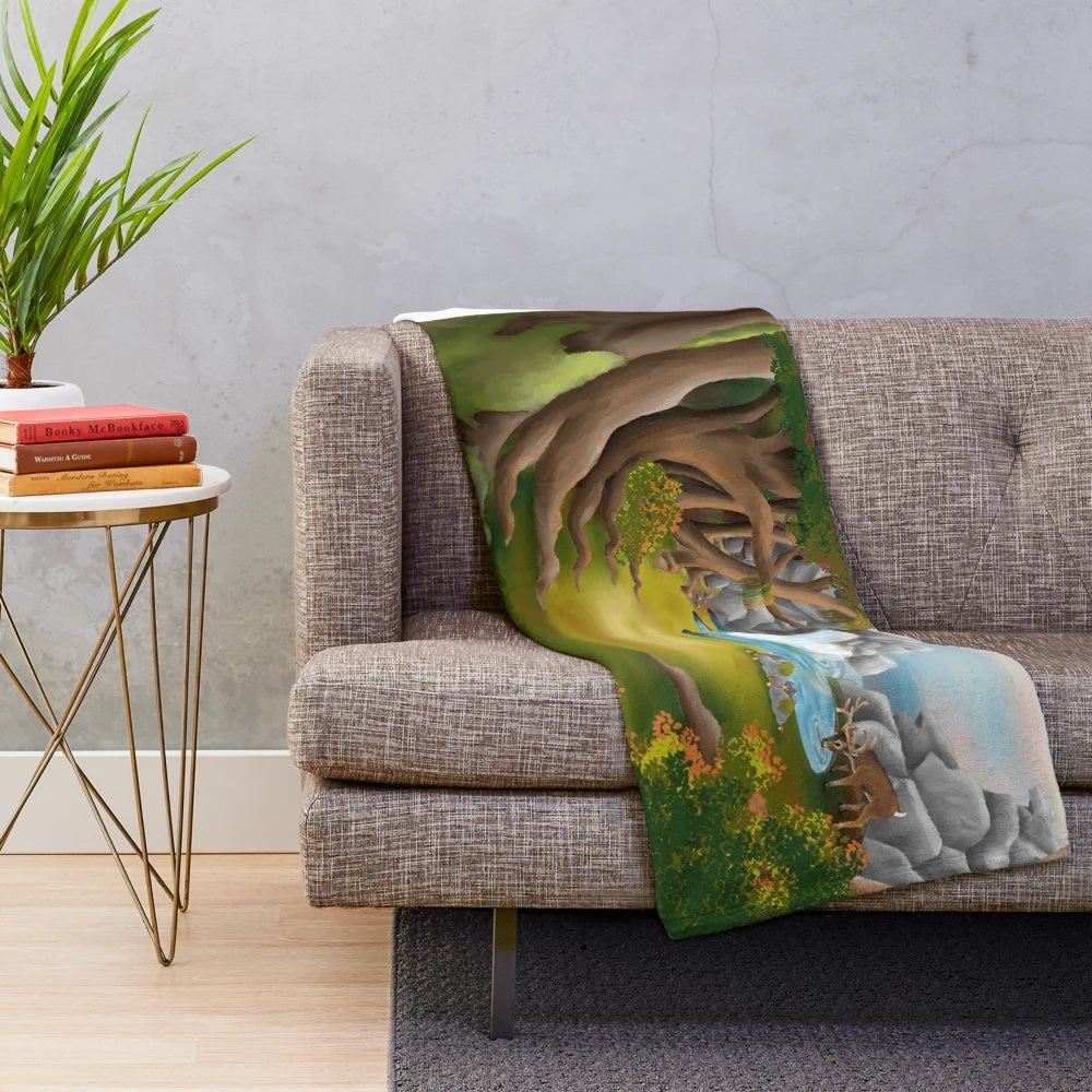Plush blanket featuring a serene woodland landscape with deer, trees, and a waterfall