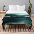 Plush blanket with a nature landscape reflection design