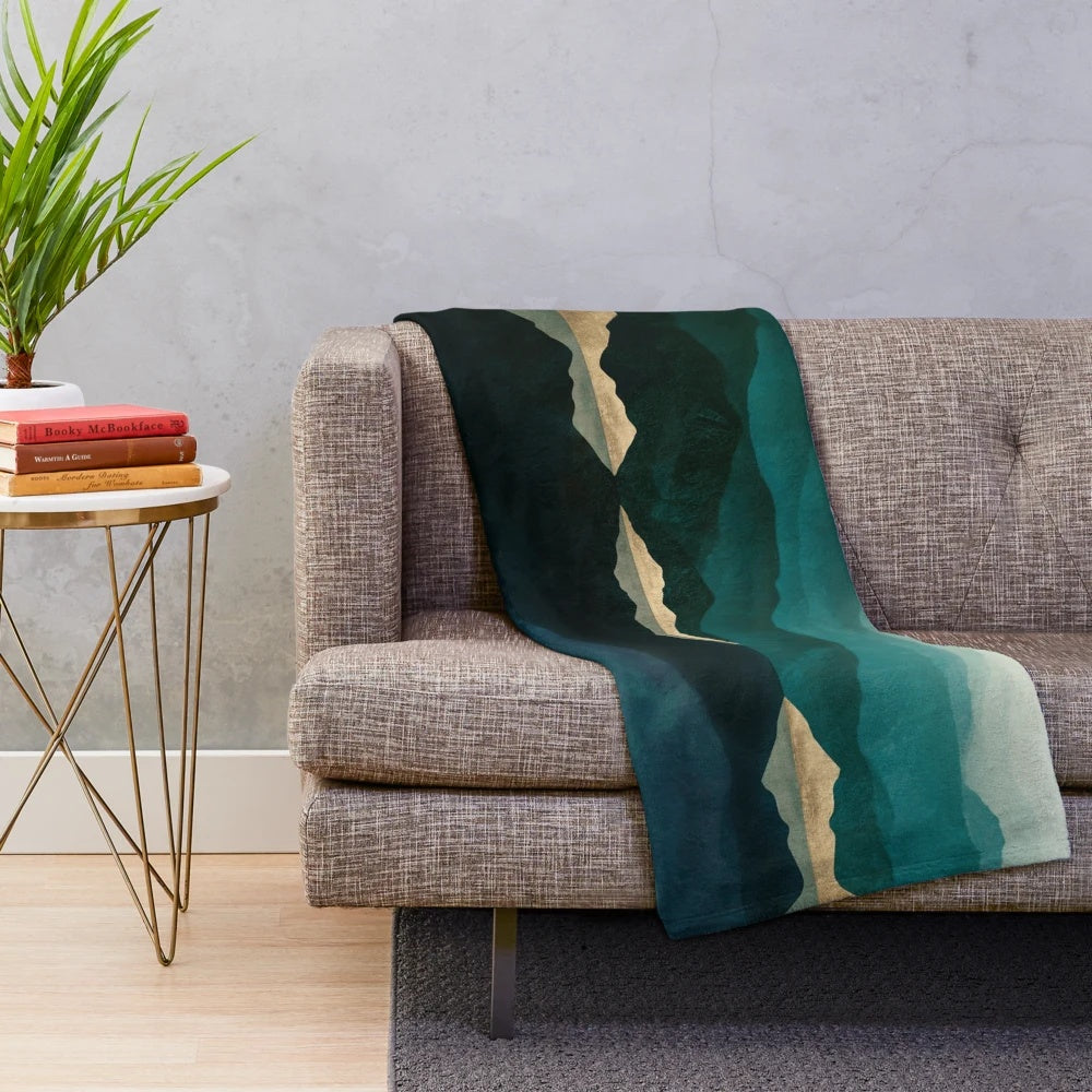 Plush blanket with a nature landscape reflection design