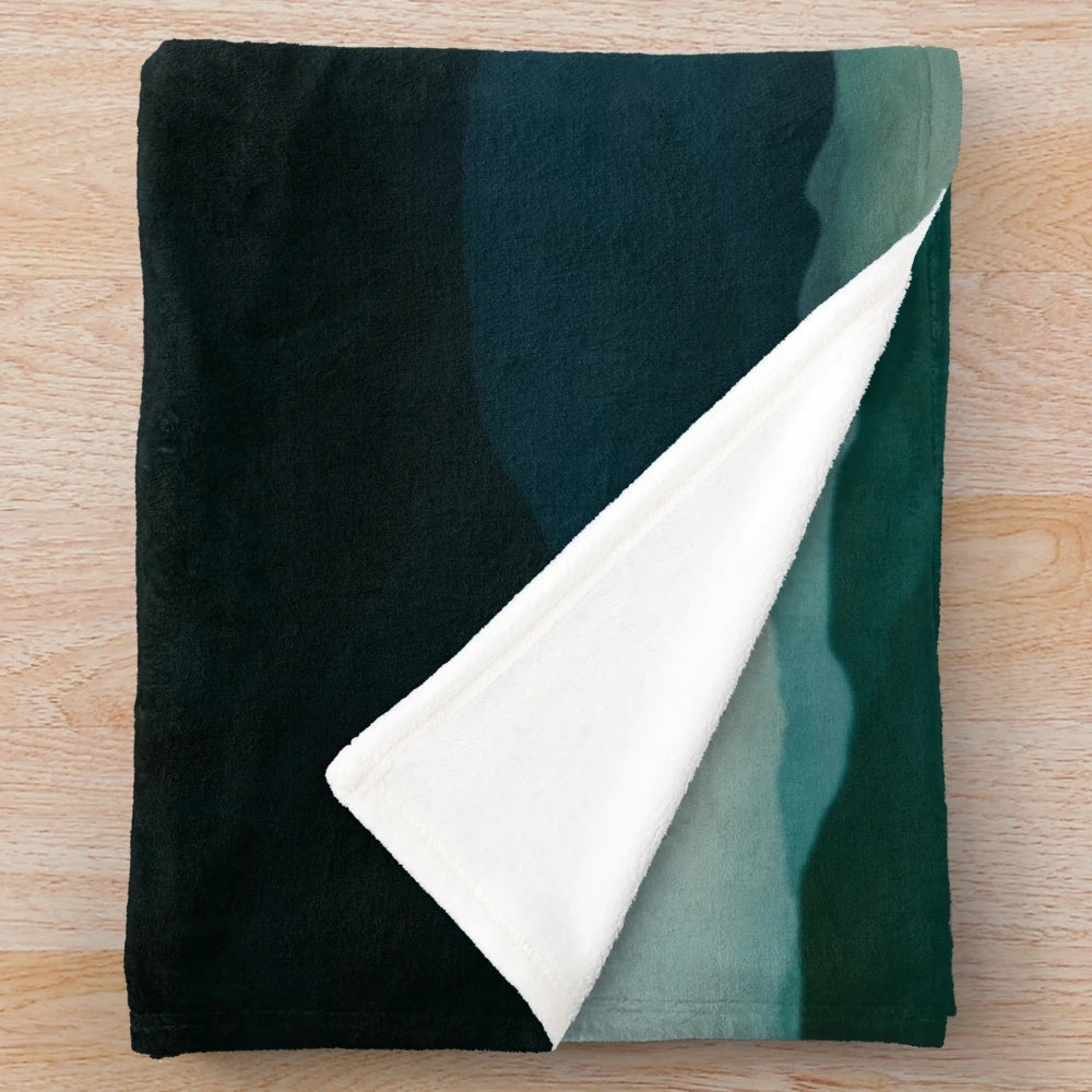Plush blanket with a nature landscape reflection design