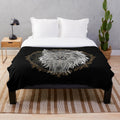 Plush blanket with a detailed mandala design featuring an animal-inspired motif