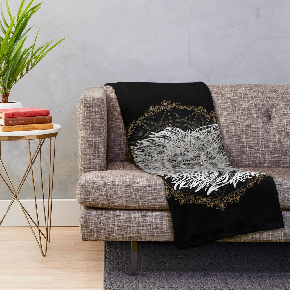 Plush blanket with a detailed mandala design featuring an animal-inspired motif