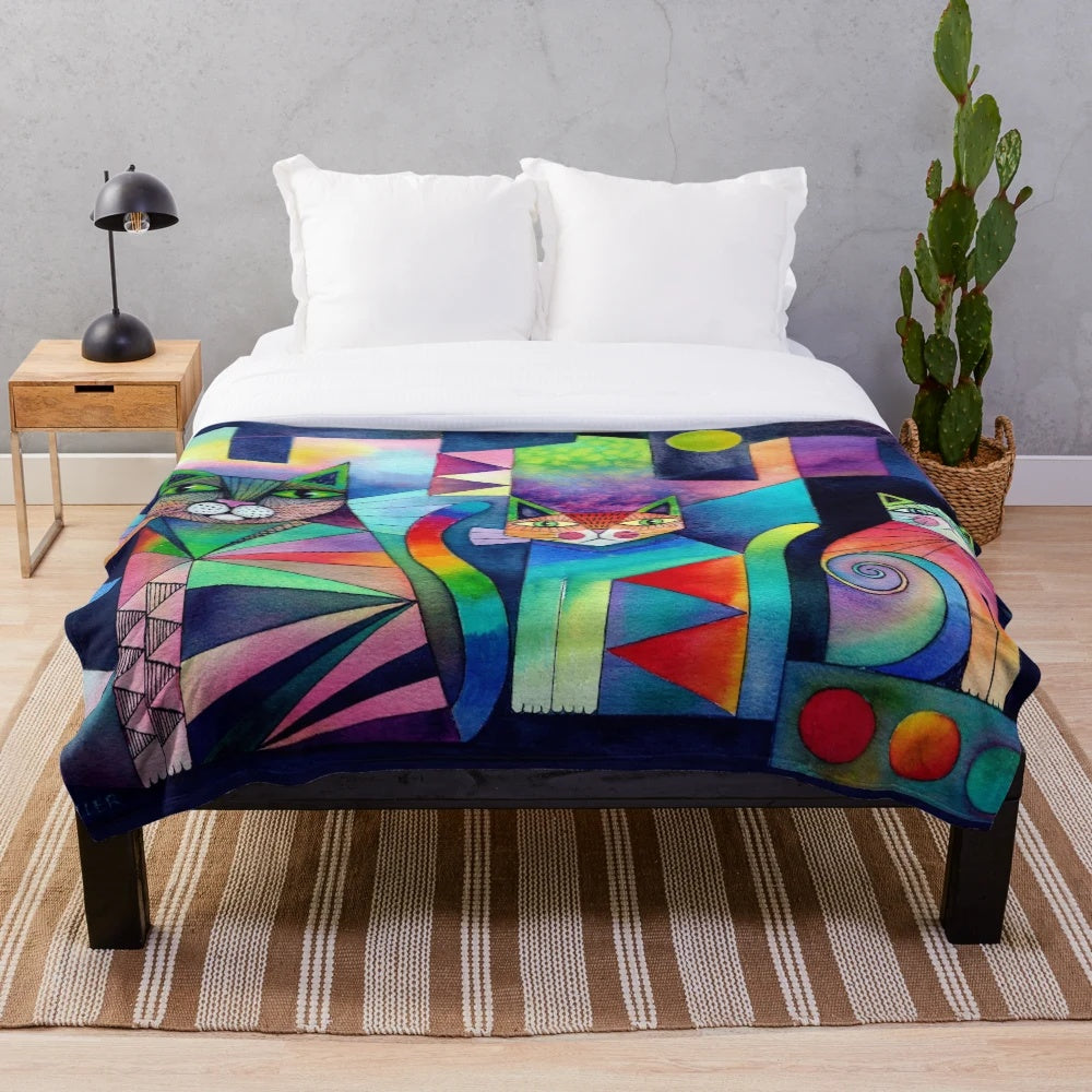 Plush blanket with abstract, colorful cats in a moonlit fantasy scene