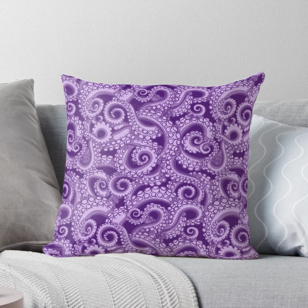 A vibrant purple octopus tentacle pillow with a whimsical sea witch design