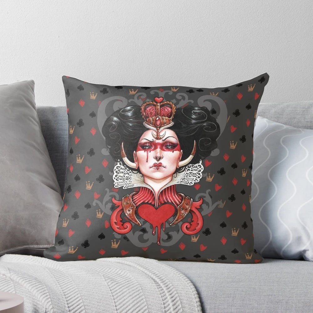 A decorative throw pillow featuring the iconic Queen of Hearts from the Alice in Wonderland universe.