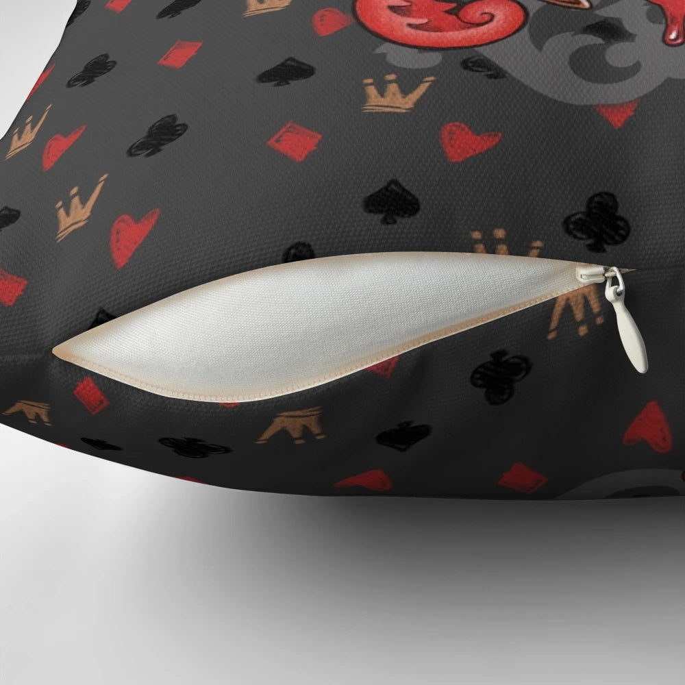 A decorative throw pillow featuring the iconic Queen of Hearts from the Alice in Wonderland universe.