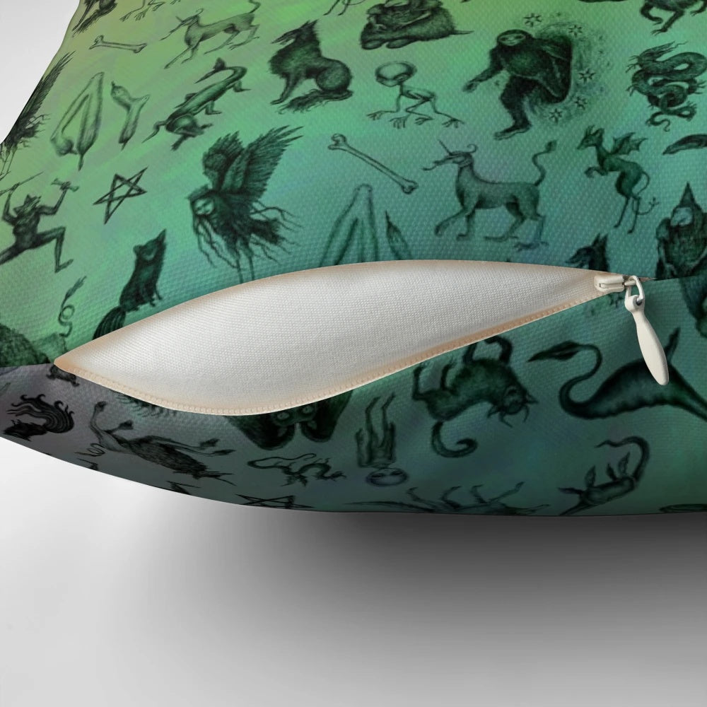 Colorful throw pillow featuring a design of various mythical creatures and cryptids in a rainbow palette.