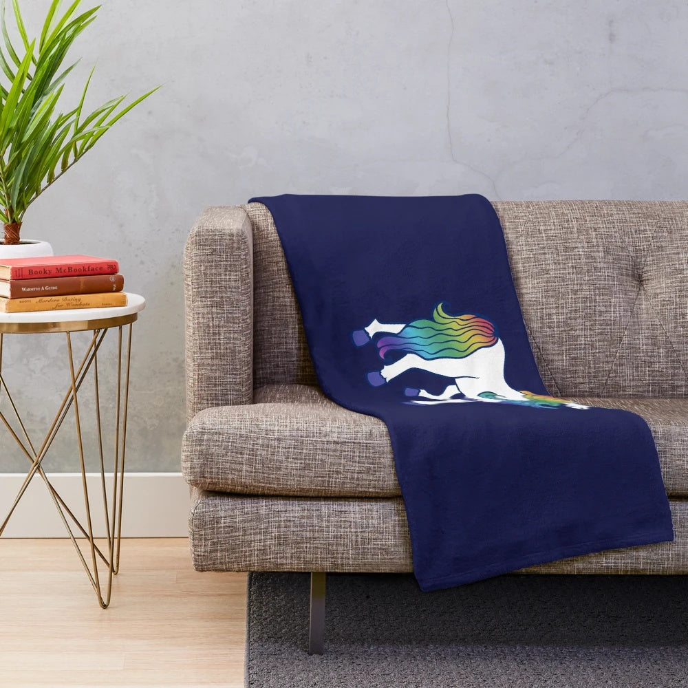 Rainbow unicorn plush blanket with soft, snuggly design