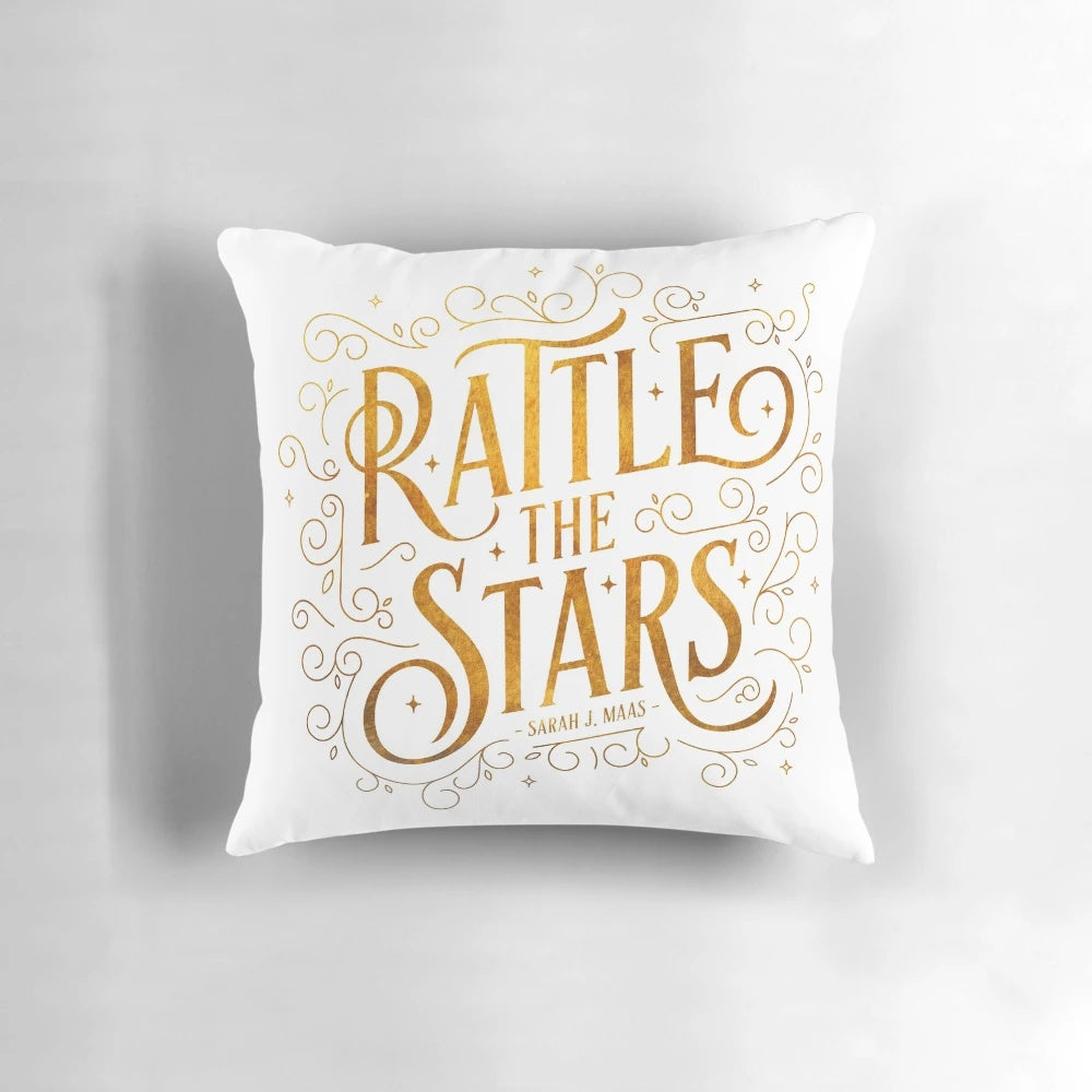Gold and swirling "Rattle the Stars" decorative pillow with a vintage, art-inspired design
