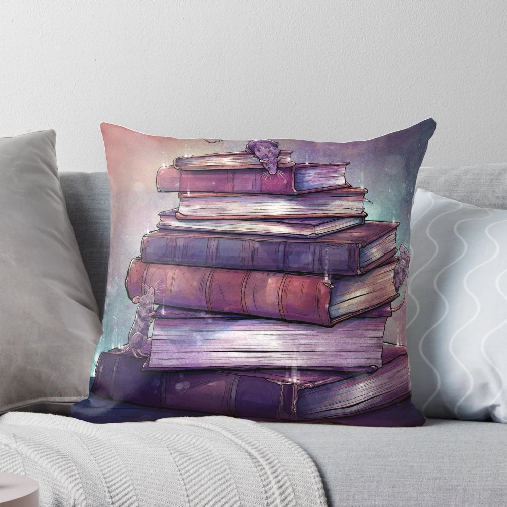 Decorative pillow with "Reading is Magic" design, featuring fantasy elements like books, mice, and magical symbols.