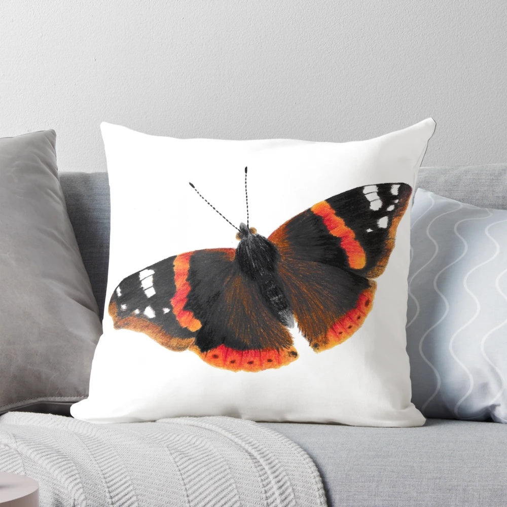Vibrant red admiral butterfly on a nature-inspired pillow design