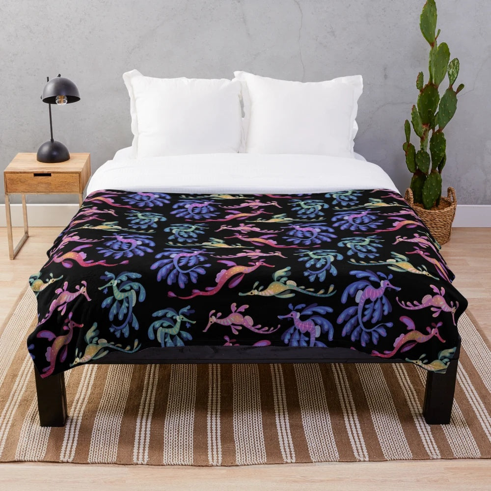 Plush blanket featuring colorful and whimsical sea dragon design