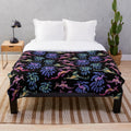 Plush blanket featuring colorful and whimsical sea dragon design