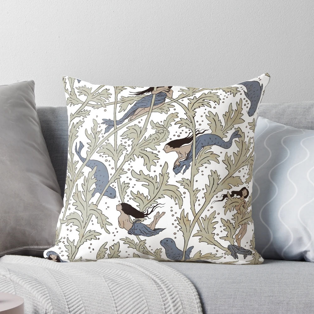 A decorative pillow featuring a swirling, ethereal design inspired by the mythical selkie creatures of coastal folklore.