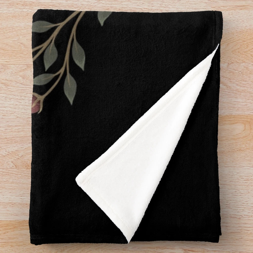 Serpent-themed plush blanket with botanical and mystical elements