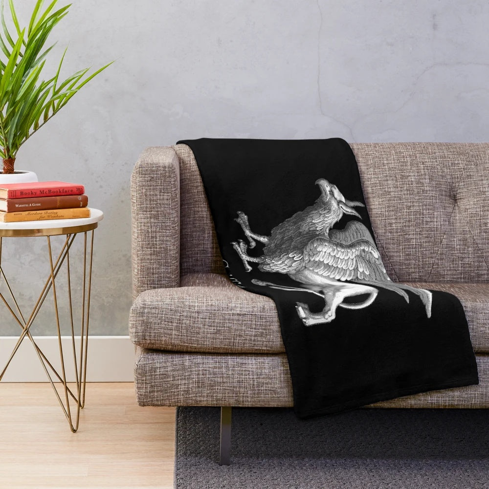Detailed silver grey plush blanket featuring a legendary griffin design