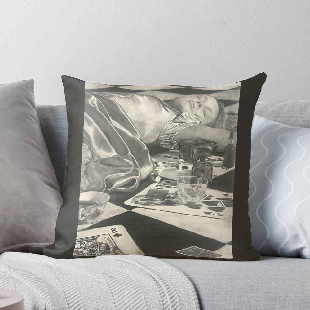 A black and white charcoal portrait of a sleeping Alice from Alice in Wonderland, printed on a pillow.