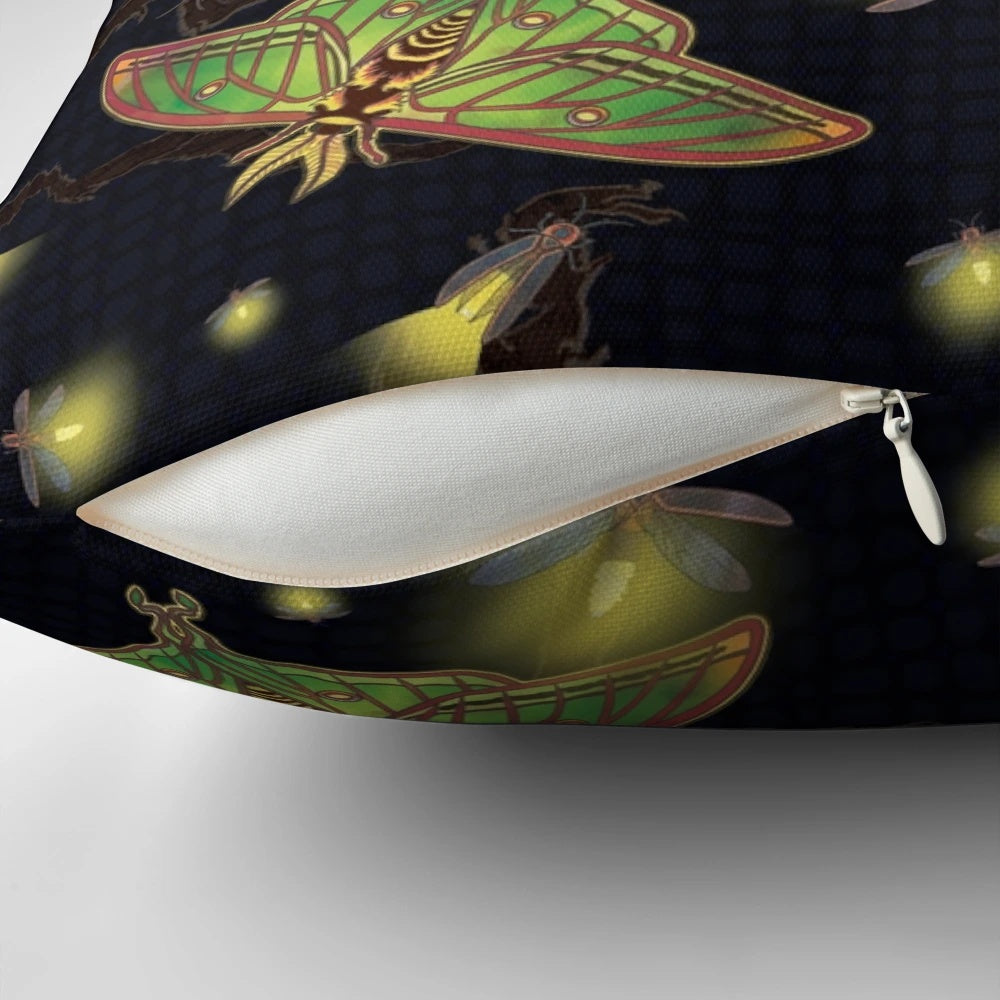 Image of a Spanish luna moth and fireflies on a stained glass-inspired pillow design