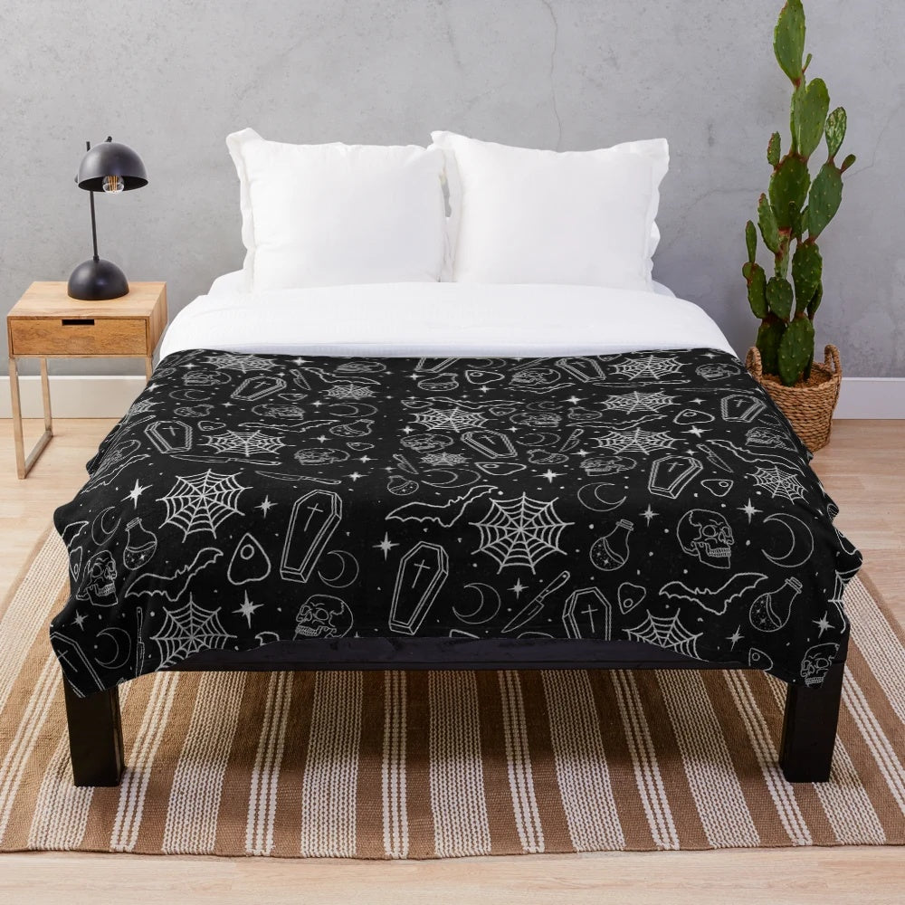 Spooky season plush blanket with gothic, ominous design